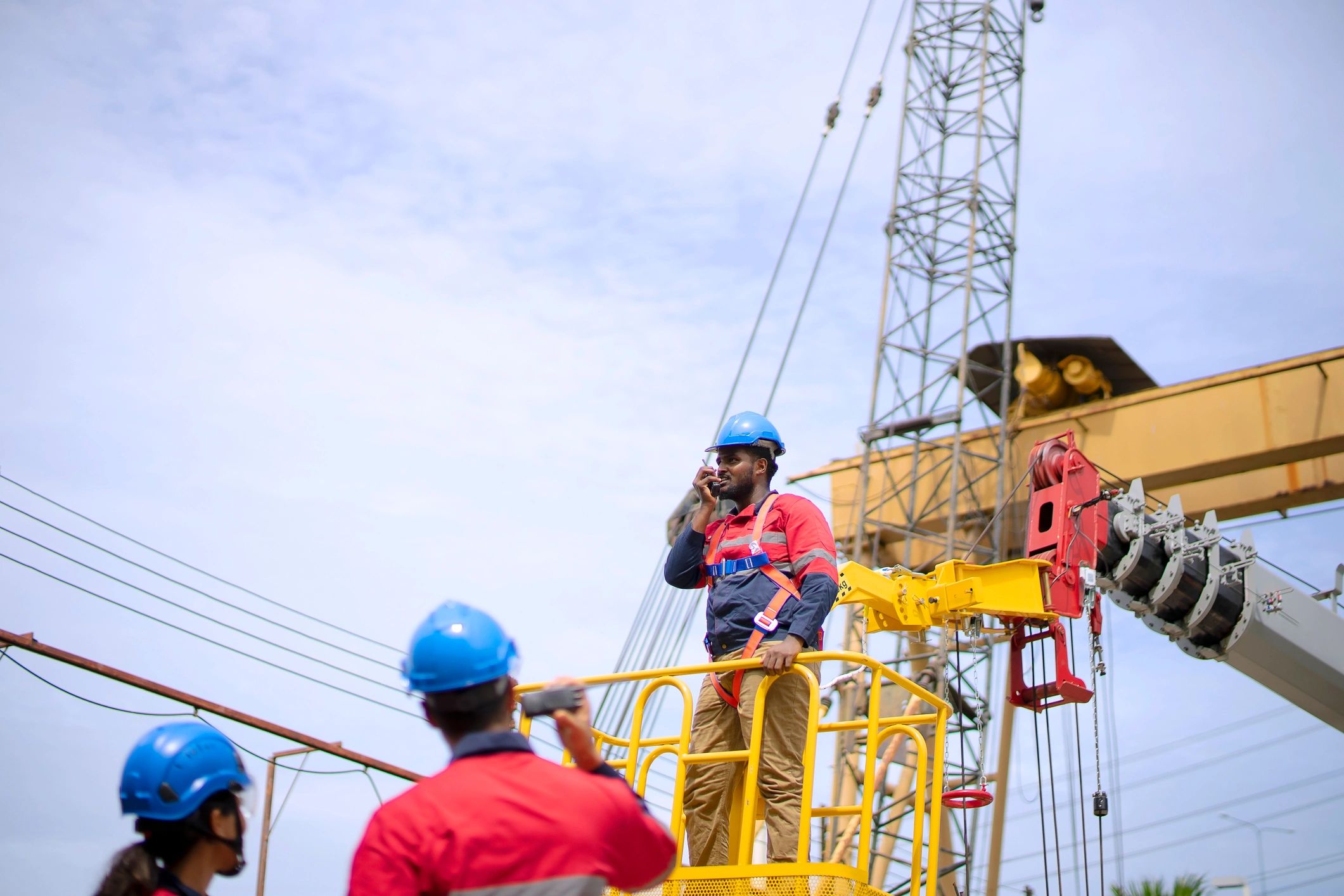 Engineers working together at an industrial construction site