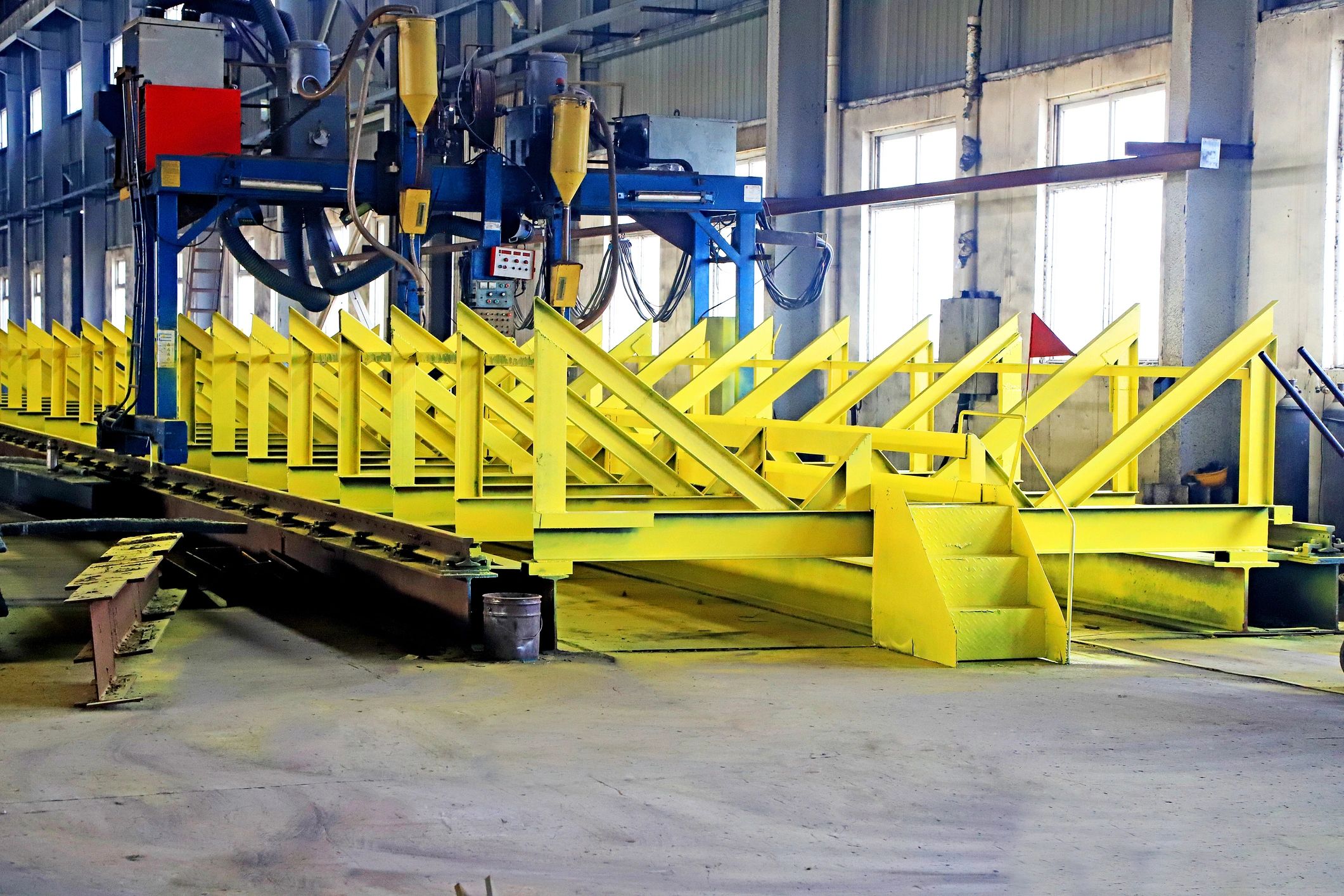 Automated welding machine on steel structural frame assembly line